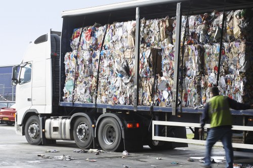Bags of separated recyclables ready for transfer at a local transfer station